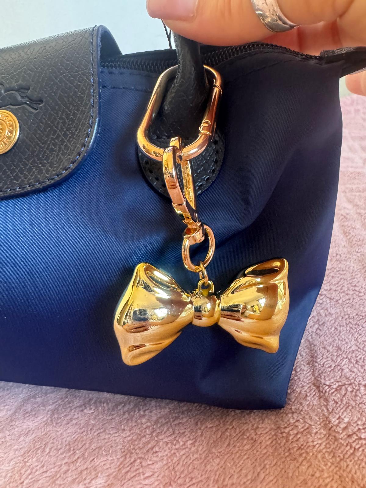 Dodatak za torbice - zlatna mašna