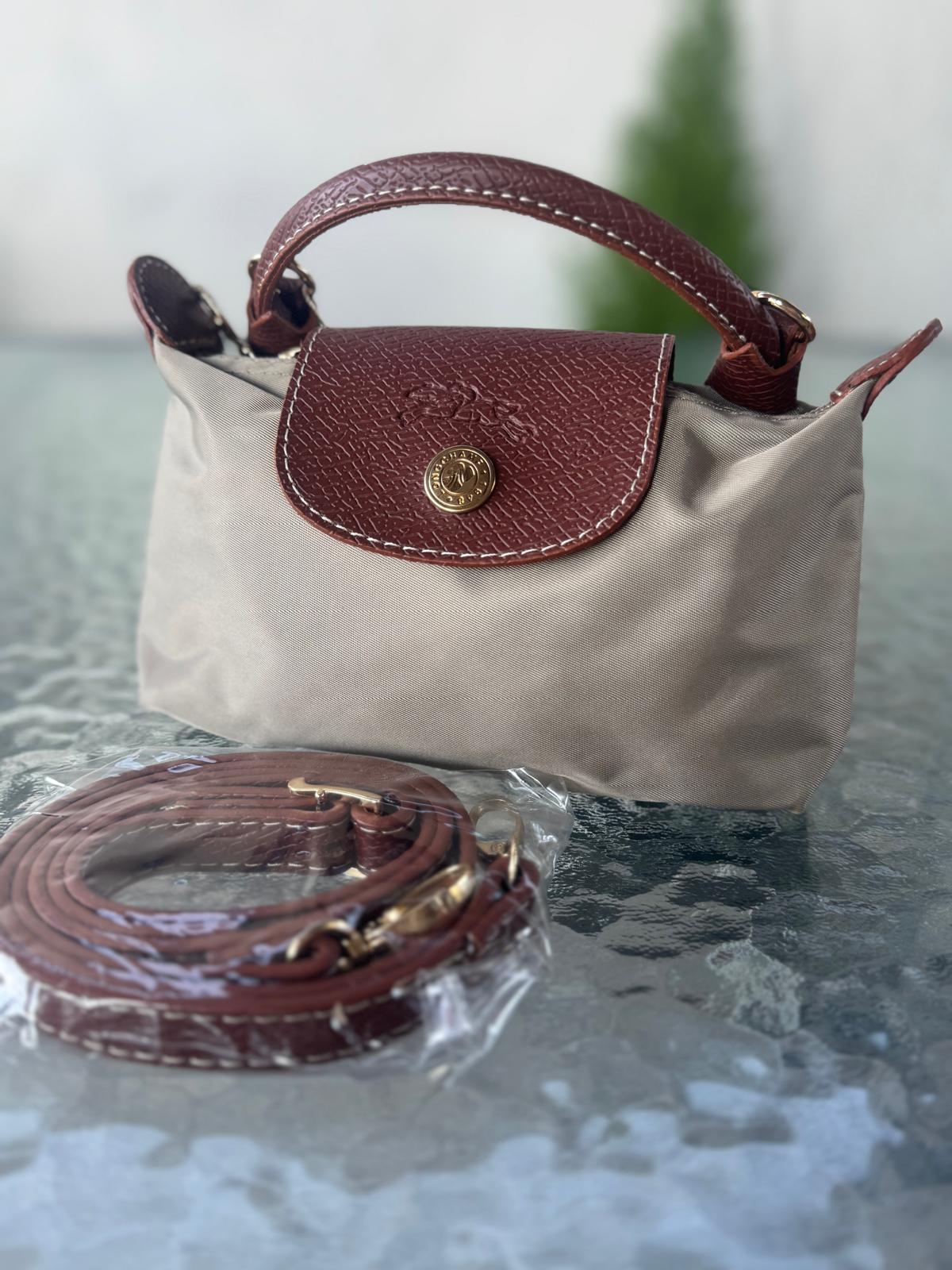 Longchamp XS modeli ( Sa kožnim remenom )