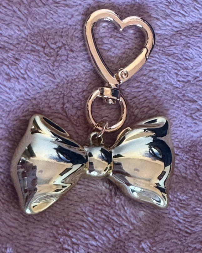 Dodatak za torbice - zlatna mašna