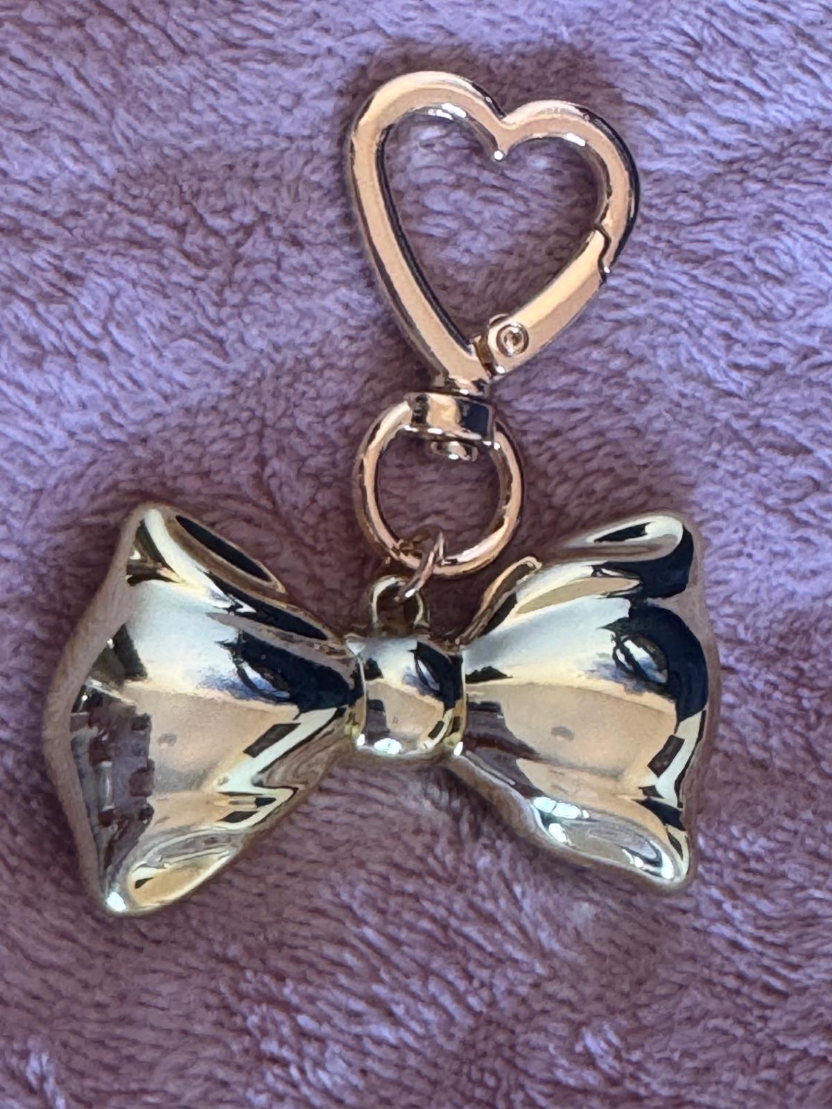 Dodatak za torbice - zlatna mašna