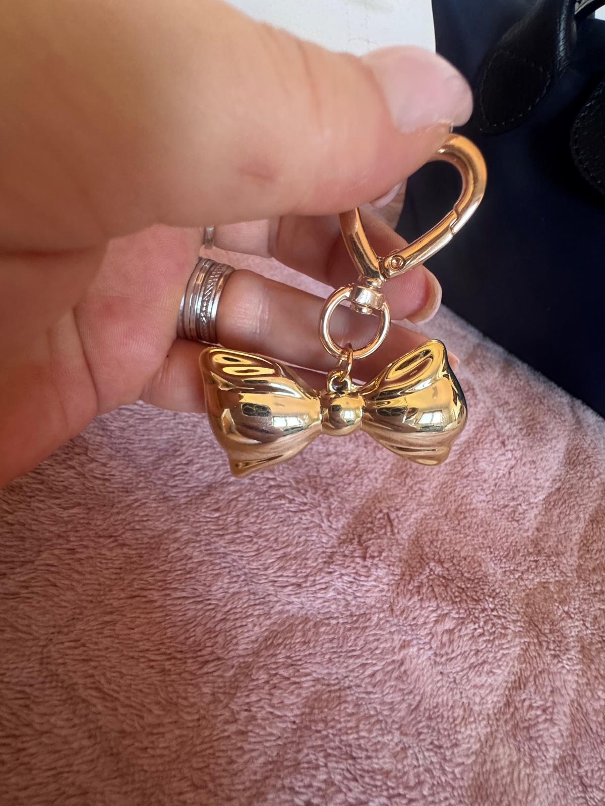 Dodatak za torbice - zlatna mašna